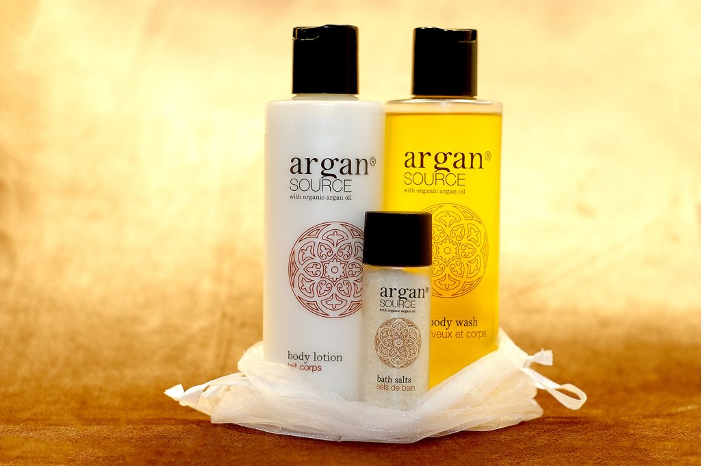 Argan Source argan oil-based cosmetic package, including 1 hair & body wash, 1 body lotion, and 1 bath salt